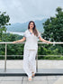 (DivyankaTripathi) Three Piece Off-White Drape Pant Set with Handbag