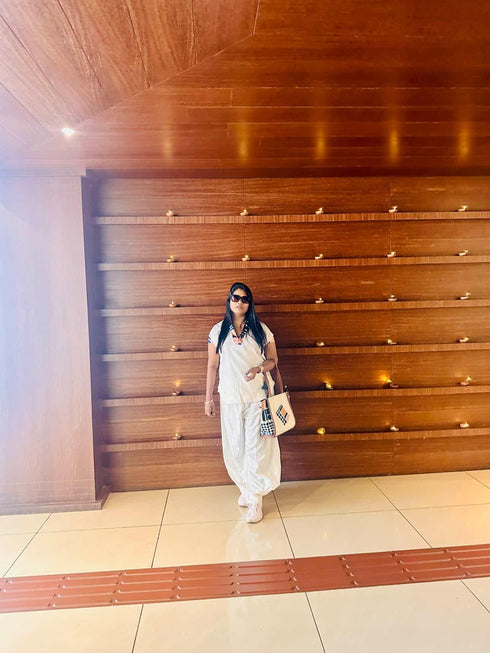 (DivyankaTripathi) Three Piece Off-White Drape Pant Set with Handbag