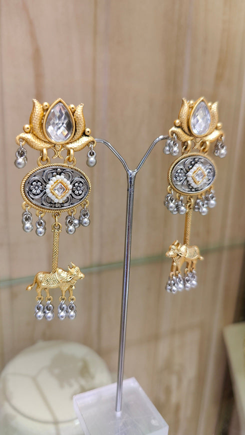 Dual-Tone Cow Motif Earrings with Lotus Studs