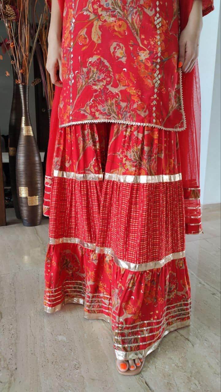 Sharara Suit - Red Gold Sharara Set Shop exclusively on LabelDC now! Label DC Sharara Suit - Red Gold Sharara Set Shop exclusively on LabelDC now! Label DC