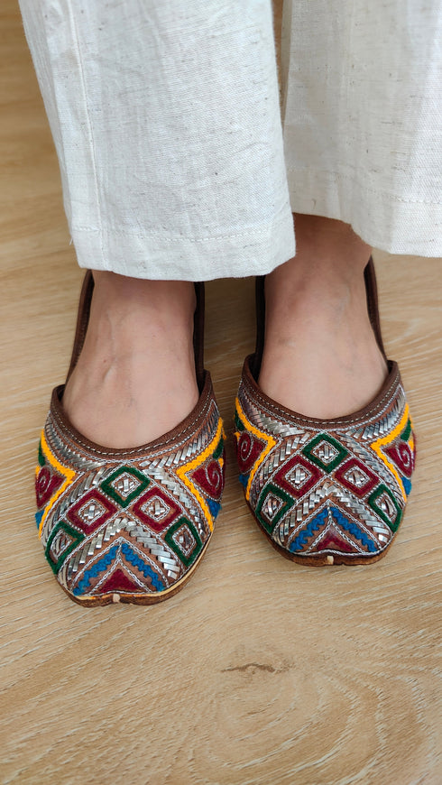 Multi-Color Geometric Thread & Silver Mukaish Pure Leather Juttis